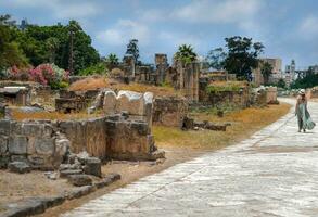 Woman Walking along Ruins Of Tyre photo