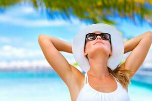 Taking sunbath on the beach photo