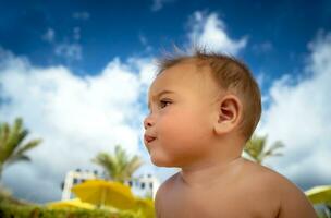 Cute little baby outdoors photo