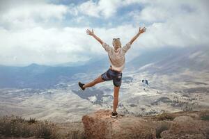 Active female in the beautiful mountains photo