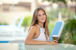 Pretty woman with morning coffee photo