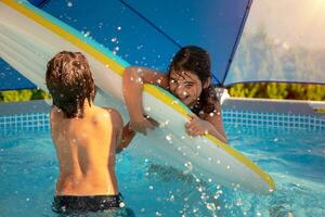 Kids Playing in the Pool photo