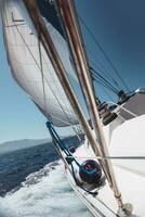 Traveling on sailboat in the sea photo