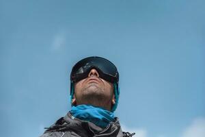 Man Skier Enjoying Winter Fresh Air photo