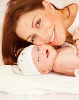 Newborn baby with mommy photo