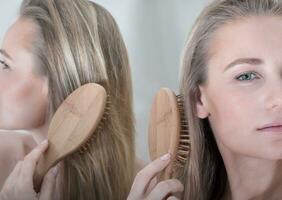 Beautiful Woman Combing Hair photo