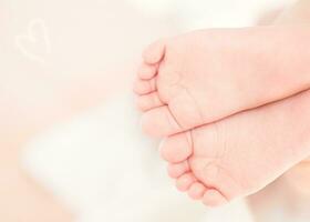 Cute little baby feet photo