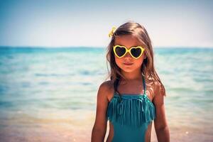 Little girl on the beach photo