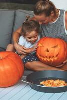 Happy family preparing to Halloween photo