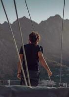 Man Traveling on Sailboat photo