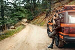 Female traveling along mountains photo