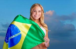 Happy fan of Brazilian football team photo