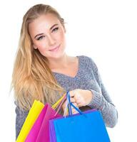 Cute girl with shopping bags photo