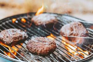 Burgers Patty on BBQ Grill photo