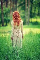 Gentle woman in the forest photo
