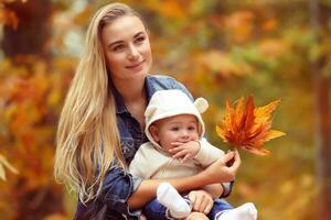 Happy family in the autumn park photo