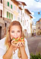 Eating Italian pizza photo