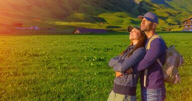 Loving couple in the mountains photo