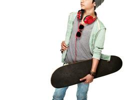 Skateboarder over white background photo