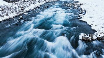 Drifting river in Iceland photo