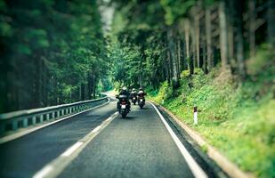 Group of bikers on the highway photo