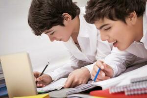 Classmates doing homework photo