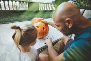 Making jack-o-lantern for Halloween holiday photo