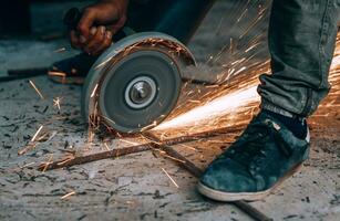 Worker Cutting Metal photo