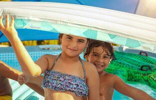 Cheerful Kids in the Pool photo