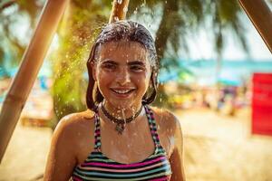 Little girl on the beach resort photo