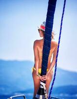 Beautiful female on the yacht photo