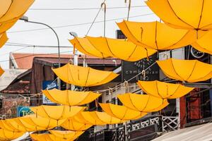 Background colorful umbrella street decoration photo