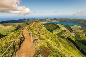 Walking path leading to a view on the lakes of Sete Cidades and Santiago in Sao Miguel, Azores photo