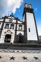 Tower of St. Sebastian church Igreja Matriz de Sao Sebastiao in Ponta Delgada, San Miguel, the Autonomous Region of the Azores, Portugal. photo