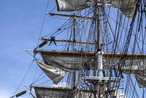 Large mast of an old sailing ship photo