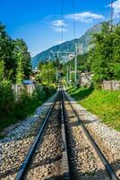 Railway tracks in a rural scene photo
