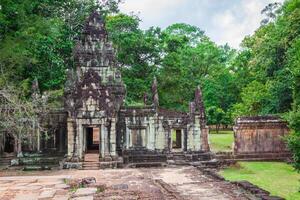 Ancient Khmer architecture. Amazing view of Bayon temple at sunset. Angkor Wat complex, Siem Reap, Cambodia travel destinations photo