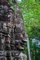 Faces of Bayon temple in Angkor Thom, Siemreap, Cambodia. photo