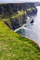 Famous cliffs of Moher with tower. Ireland photo