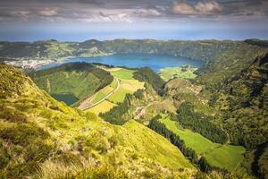 Walking path leading to a view on the lakes of Sete Cidades, Azores, Portugal photo