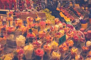 Fruits and vegetables stall in La Boqueria, the most famous market in Barcelona. photo