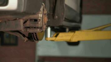 Close-up of a mechanic changing a car wheel. video