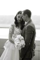 bride and groom first meeting on the roof of skyscraper photo