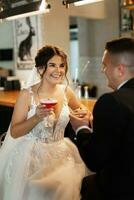 bride and groom inside a cocktail bar photo