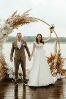 wedding ceremony of the newlyweds on the pier photo