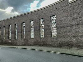 old industrial building, brick and steel photo