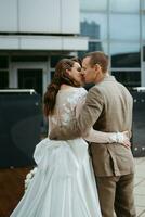 bride and groom first meeting on the roof of skyscraper photo