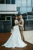 bride and groom first meeting on the roof of skyscraper photo