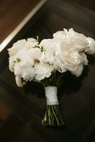 elegant wedding bouquet of fresh natural flowers photo