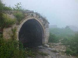 Santa Ruins in foggy weather, Gumushane, Turkey photo